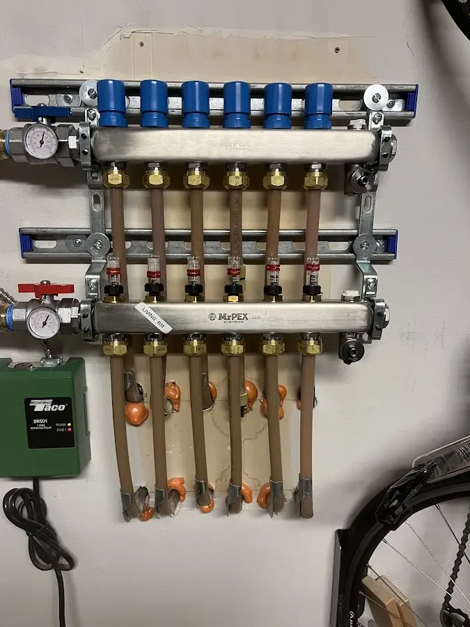 Plumber performing Water Heater Repair at a residential property in Spanish Fort